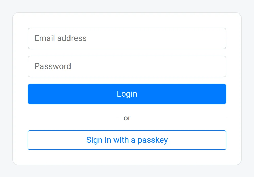 A client login form with email and password fields and, under an or divider, a Sign in with a passkey button.